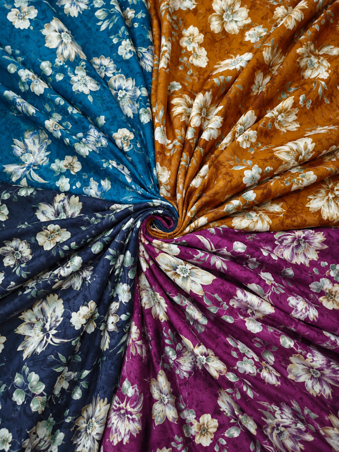Spiral Floral Fabric in Vibrant Hues Fabric